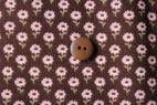 YUWA 綿麻（コットンリネン）キャンバス tiny flowers ブラウン　の商品イメージ画像