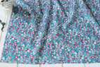 綿（コットン）ローン 小花柄 ターコイズブルー の商品イメージ画像