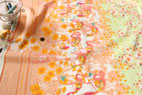 綿（コットン）ローンワッシャー　ハッピーニュース　by Kayo Horaguchi　オレンジ の商品イメージ画像