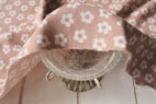 綿（コットン）ジャガードニット　お花　ミルクティ の商品イメージ画像