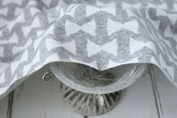 綿（コットン）ジャガードニット　リボン　杢グレー の商品イメージ画像