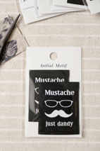 モチーフタグネーム　Mサイズ　Mustache　の商品イメージ画像